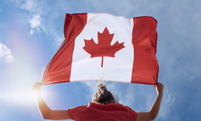 Canada Express Entry for Self-employed Individuals: A picture of self employed lady with Canadian Flag