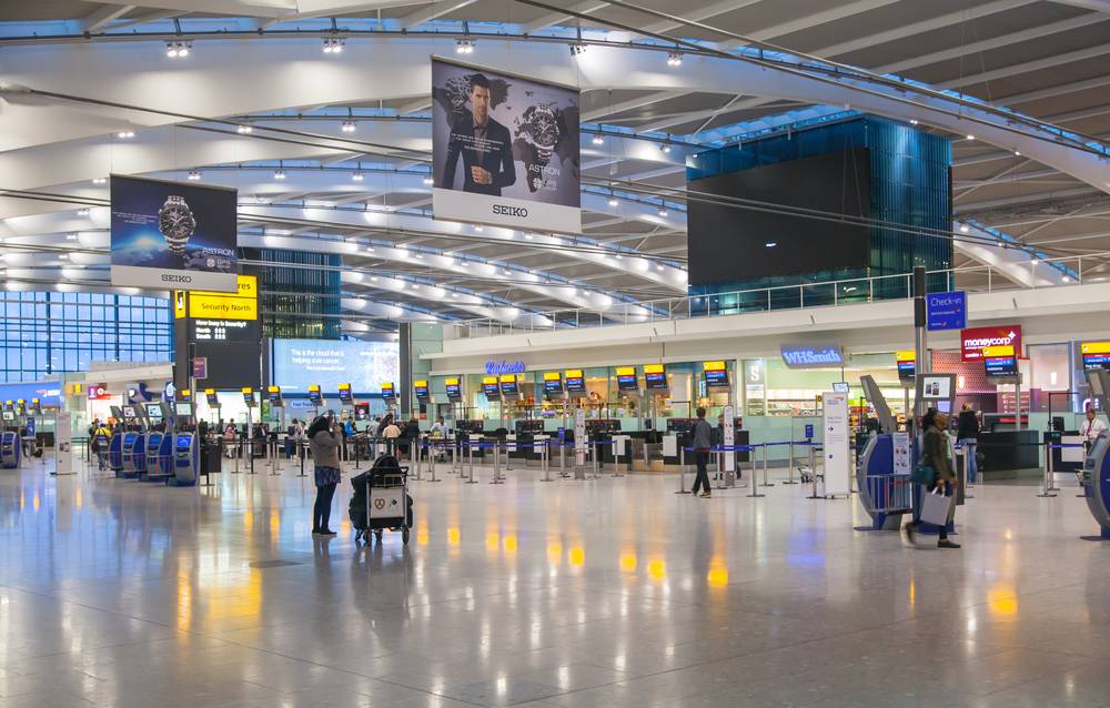 Book Cheap Flights to the UK: A picture of the Interior of departure hall Heathrow airport Terminal