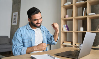 Remote Job Opportunities for Immigrants in Canada: A picture of a happy remote worker, working from home