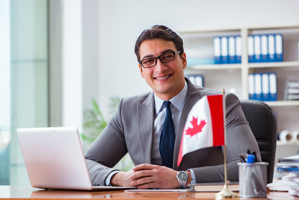 Canada Investor Visa: A picture showing a Canadian Start-Up investor in his office.