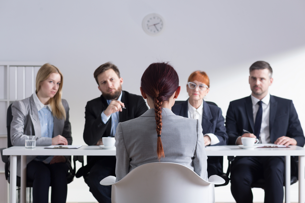 Worst Rookie Errors for First-Time UK Job Seekers: A picture showing a job seeker in an interview session with recruiters. 