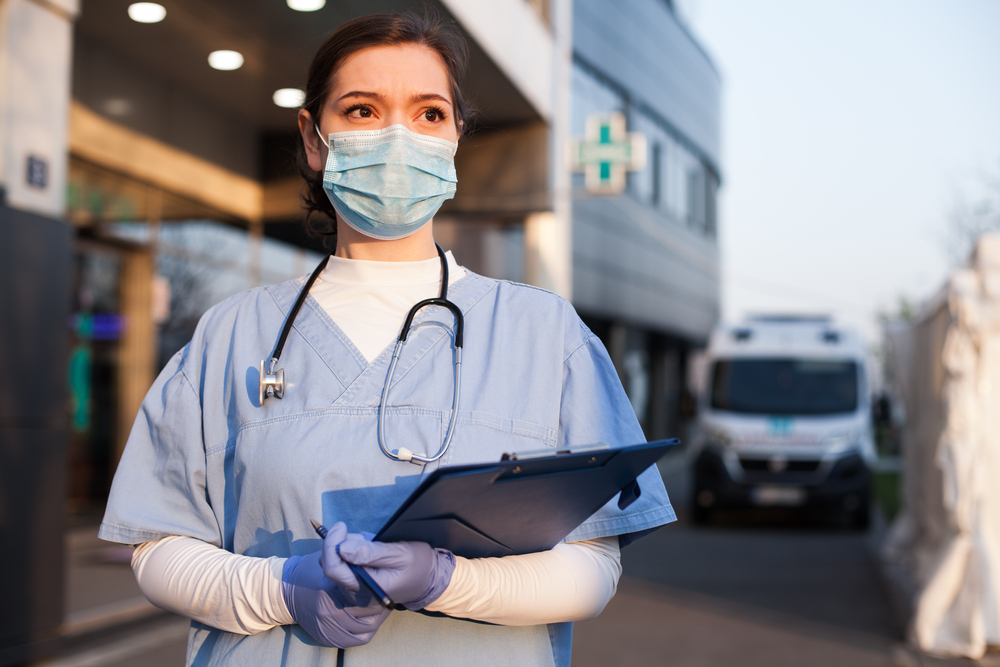 Things to Know Before Applying for a UK Skilled Worker Visa: A picture showing a medical doctor on Skilled Worker Visa in UK.