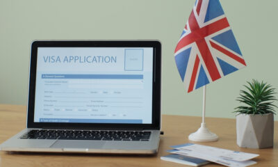 How to Avoid UK Visa Rejection: A picture showing a laptop displaying UK visa application form