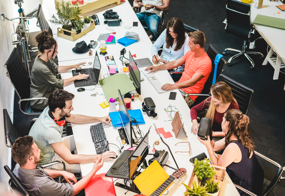 UK Job Hunt: A picture showing groups of professionals in a conference meeting.