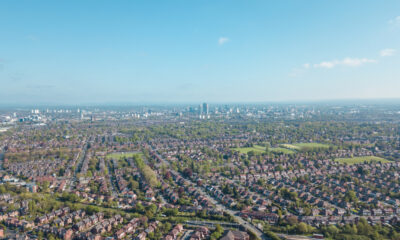 London vs Manchester: Ariel drone view houses in Manchester England Residential