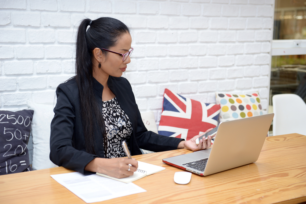 The Biggest UK Job Application Mistakes: Business women in the workplace atmosphere.