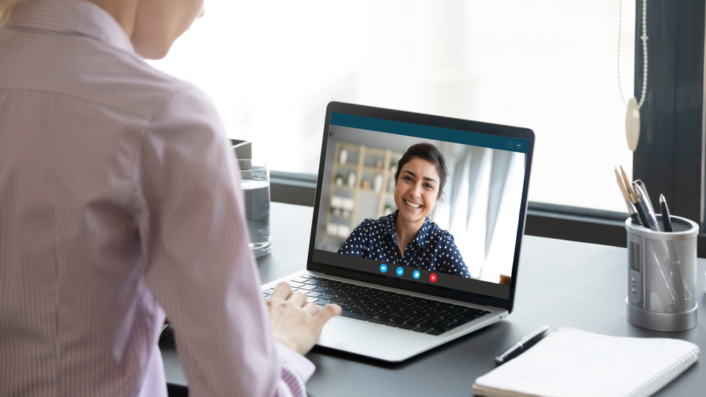 How to Avoid Burnout When Working Remotely: Picture of a lady in a zoom meeting