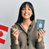 Mistakes People Make When Applying for a Canada Visa: A picture showing a lady who have just sailed through visa application mistakes, holding passport and flag.