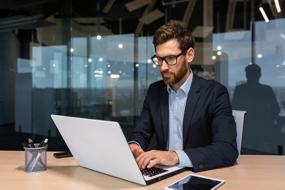 Best and Worst Industries for Remote Work: Picture of a man working on his laptop
