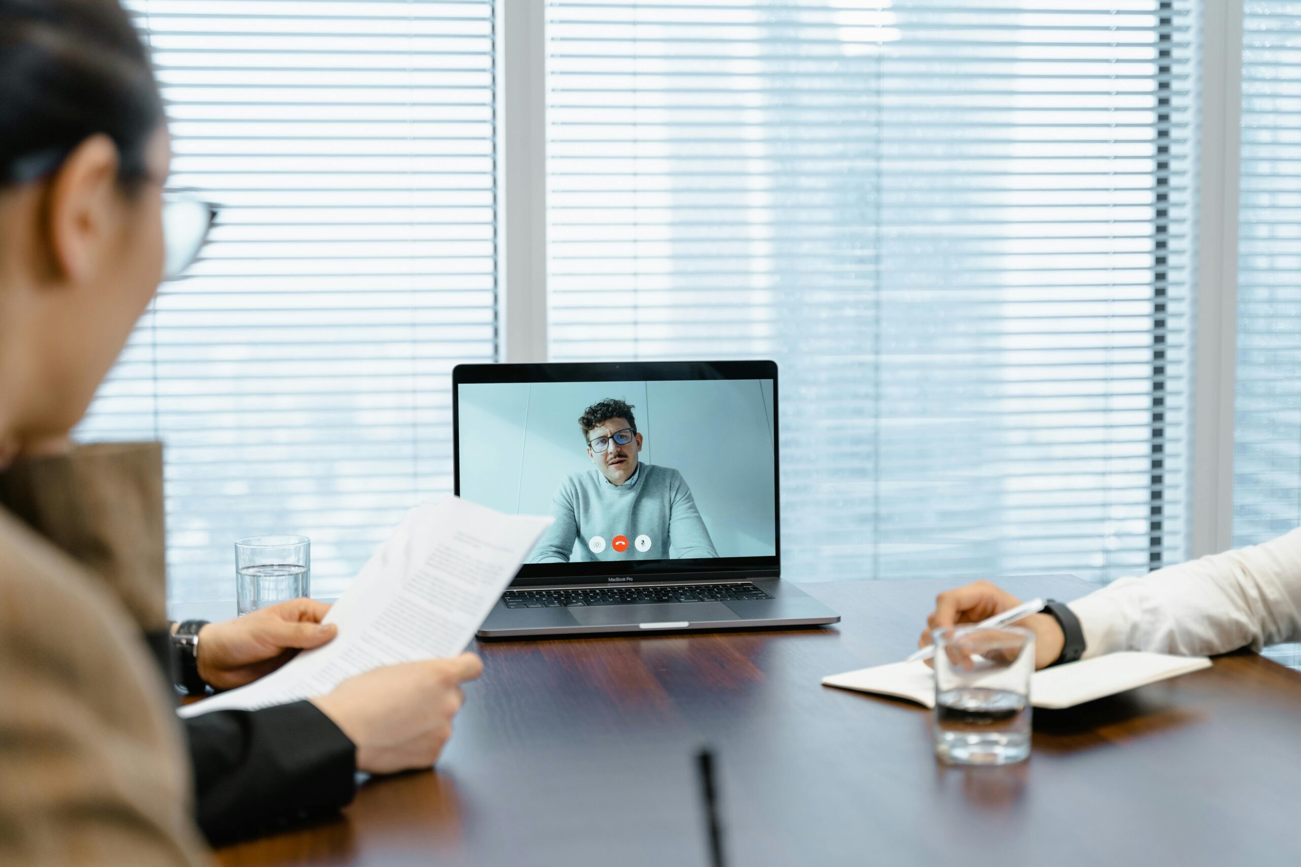  Secure Your Preffered Remote Job at Twilio: Image of a man in a virtual interview meeting