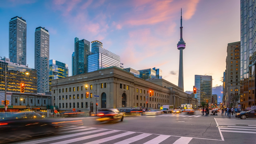 Toronto vs Vancouver: Picture of a Downtown Toronto city Skyline at twilight in Ontario, Canada. 