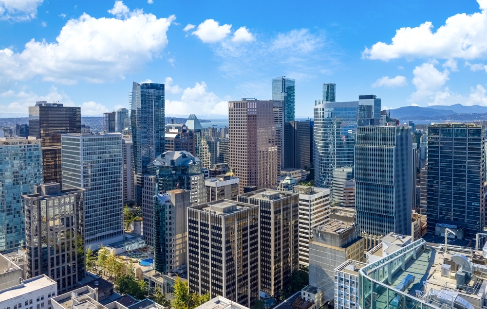 Toronto vs Vancouver: Scenic Vancouver financial district skyline in the city downtown near Robson square. 