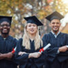 How to avoid a Canada study permit refusal: 2 males and a female in their graduation wear