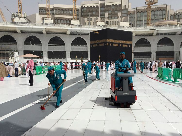 Cleaning Jobs at The Ka'abah, Mecca: A picture showing cleaners working in Ka'abbah, Mecca