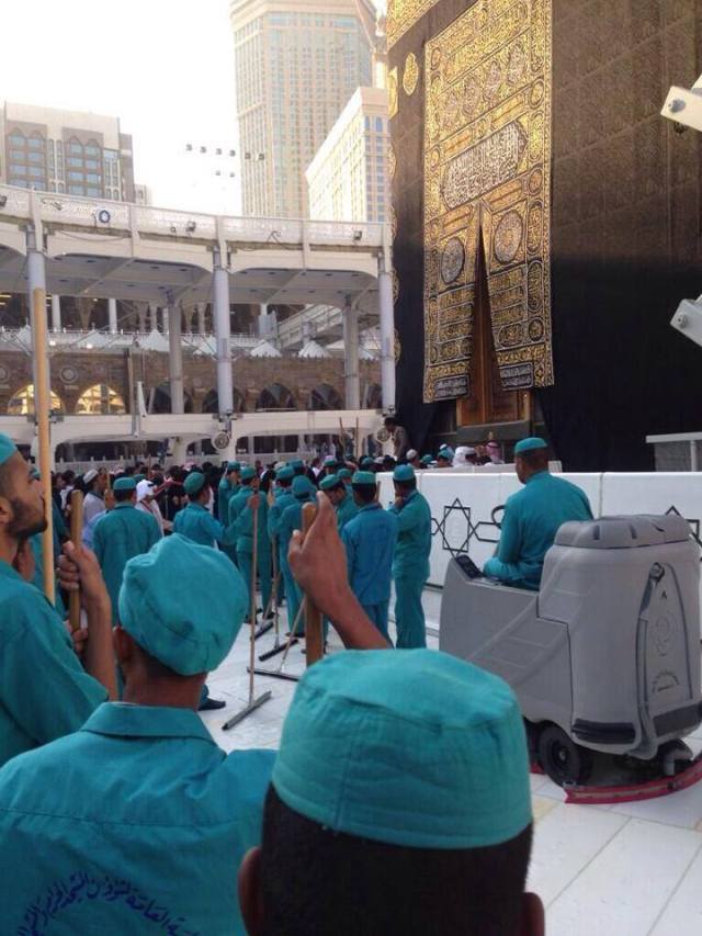 Cleaning Jobs at The Ka'abah, Mecca: A picture showing cleaners working in Ka'abbah, Mecca