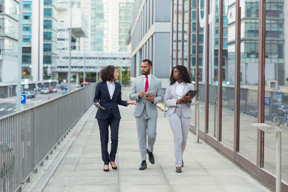 Montreal vs Calgary: Professional business team talking on street 