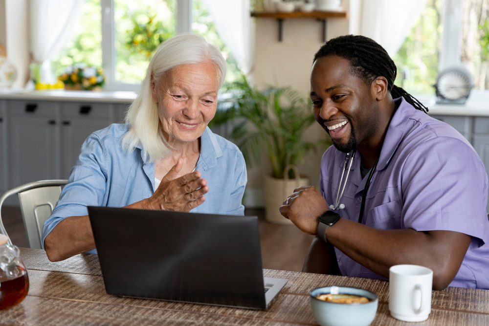 Canada Caregiver Program vs Temporary Foreign Worker Program: Picture of a caregiver carrying out his duty