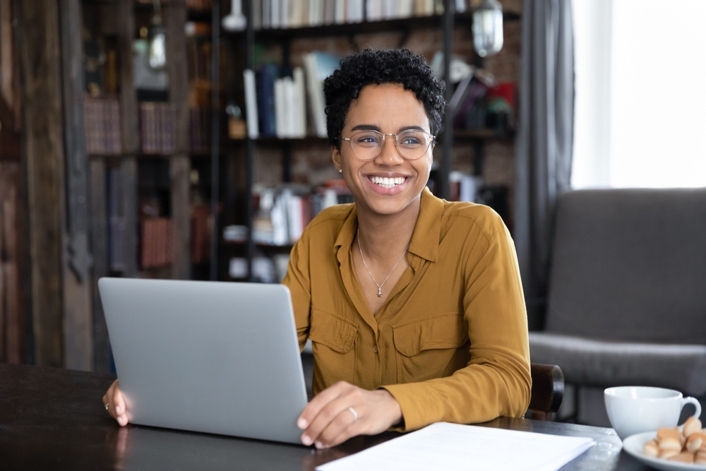 Best Remote Companies You Should Work for in 2024: A female freelancer working from home