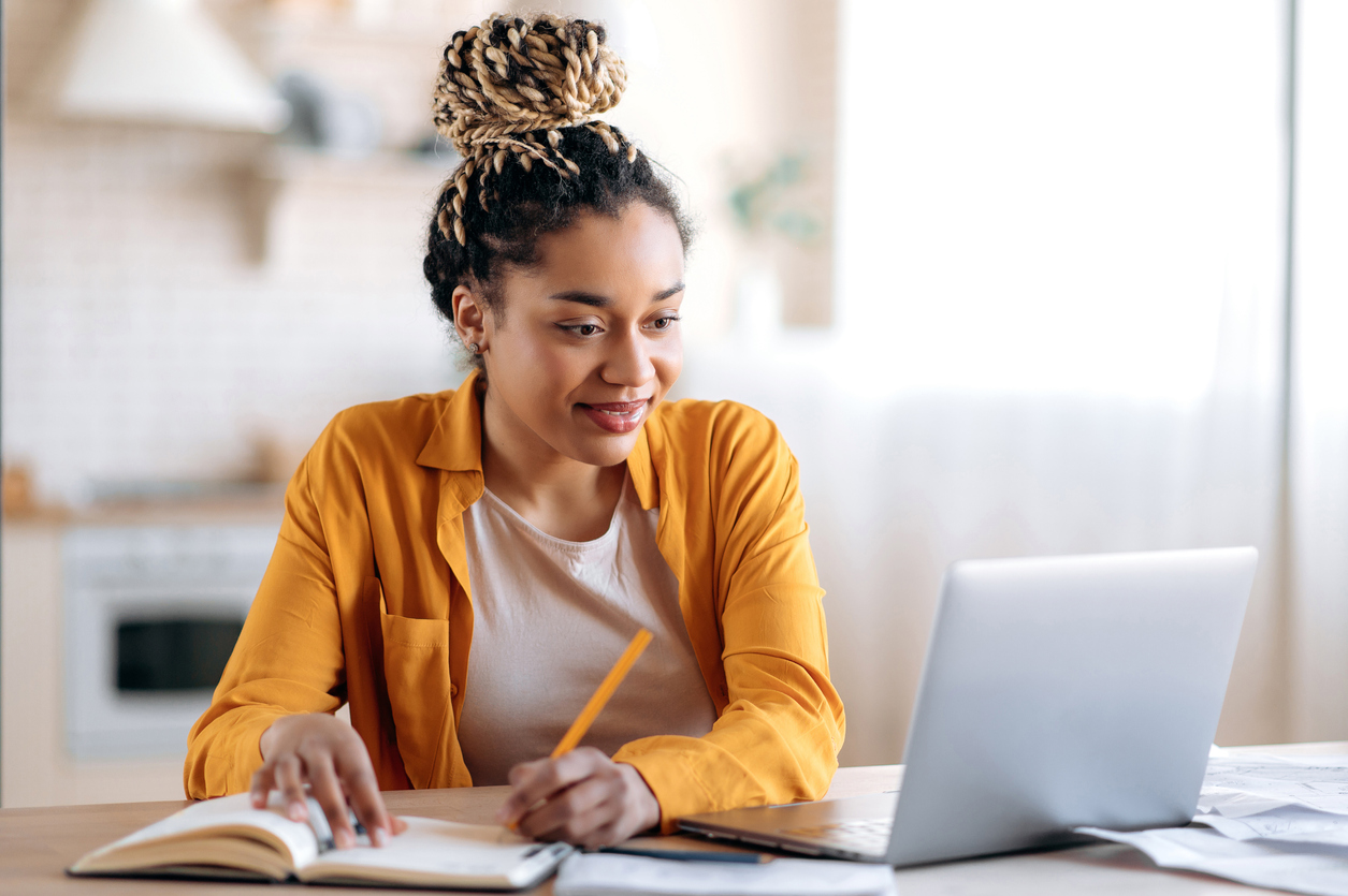 Secure your Dream Remote Job at Coursera: Picture of a lady taking course on coursera