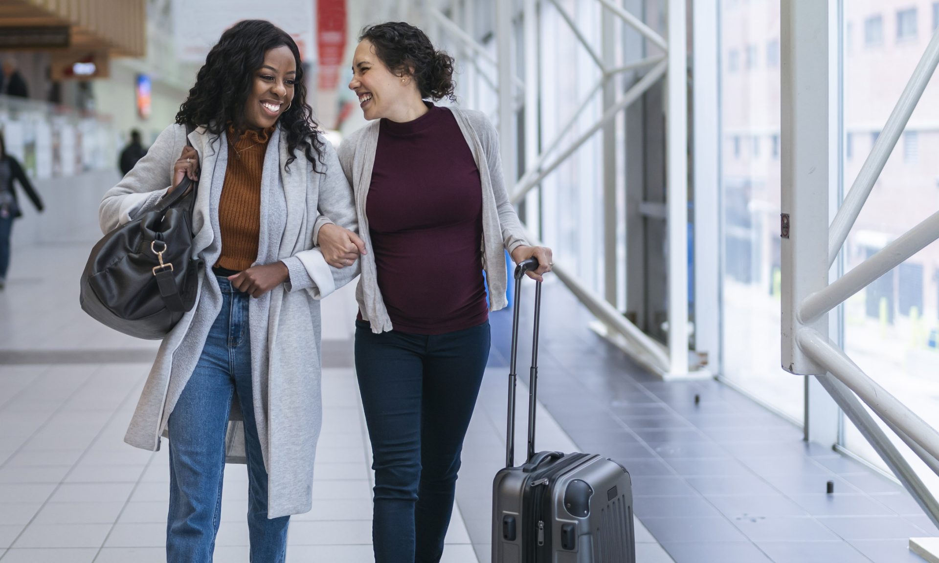How to Build Credit as a New Immigrant in Canada: Picture of two immigrants in Canada